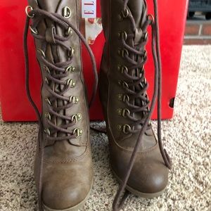 Lightly worn boots with a heel